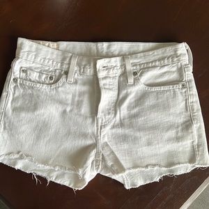 Levi’s 501 white cut off jean shorts